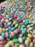 A pile of candy eggs

AI-generated content may be incorrect.